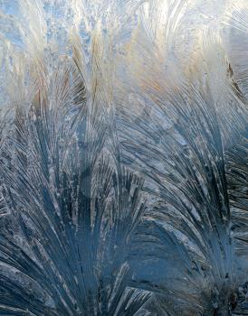 Frost on the window glass under the sunlight for background