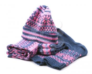 Winter woollen set of knitted cap, scarf, pair of socks and headband  isolated on white background