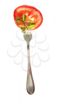 Fresh tomato slice on the fork isolated on the white background