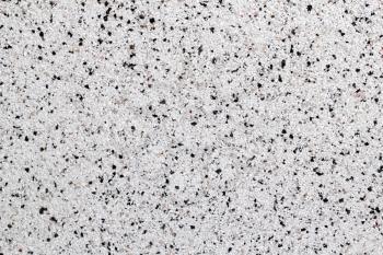 Closeup view of white natural marble chip plaster surface