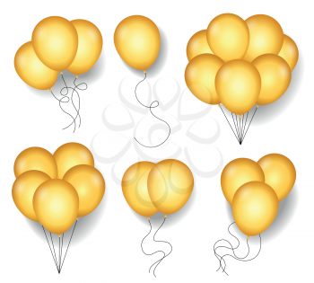 Golden ballons with rope cords isolated on white background for new year party or festive anniversary celebration. Gold or yellow balloon set