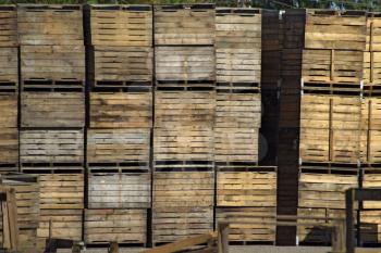 Wooden boxes stacked together. Warehouse empty wooden containers.