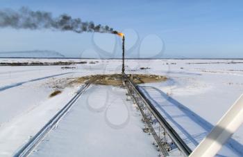 System of a torch on an oil field. Area flare system.