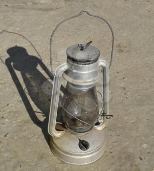 Old kerosene lamp. The old lighting fixture.