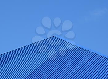 Blue roof metal sheets. Modern types of roofing materials.