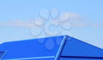Blue roof metal sheets. Modern types of roofing materials.