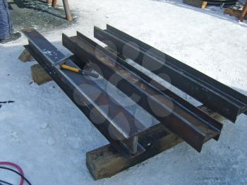The pieces of a channel cut by welding. Installation works.