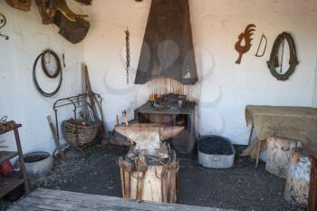 Vintage Room blacksmith forging metal. Construction of the blacksmith's life.