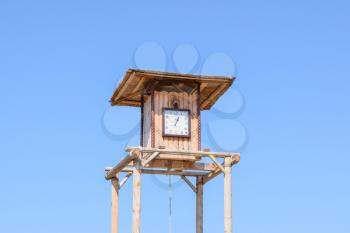 Russia, Ataman - 26 September 2015: The wooden clock tower. for time tracking in a village in the old days.