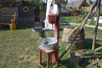 Washbasin with a basin in the yard. The old way of life in the village.