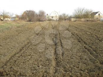 Disc harrow plow the garden. Private infield. Caring for the soil. Preparation for sowing.