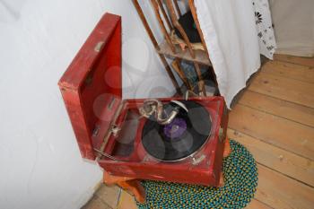 Ancient dusty record player. Entertainment of residents of the Russian village of the beginning of the 20th eyelid.
