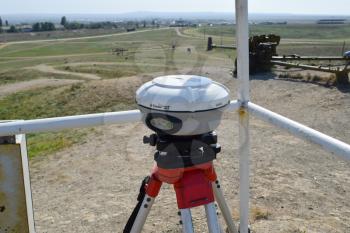 Ataman, Russia - September 26, 2015: Theodolite at work. Application of the device for measurement of a theodolite.