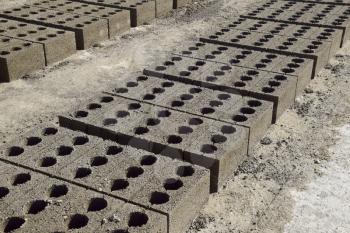 Cinder blocks lie on the ground and dried. on cinder block production plant