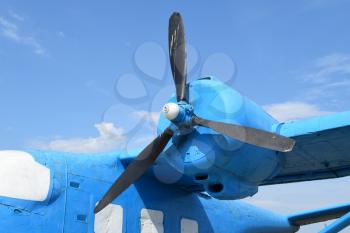 Blue rotary-wing aircraft on the hill. Open-air museum.