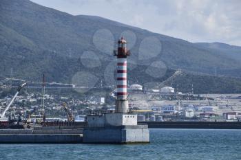 Lighthouse in the port city. Lighthouse in Tsemess bay near Novorossiysk.