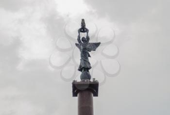 Novorossiysk, Russia - May 28, 2016: Woman angel on top of the stele. Column with angel. Woman with wings monument. Stella the city of Novorossiysk.