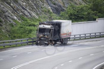 Novorossiysk, Russia - September 6, 2016: Burnt truck on the highway. The car after the fire.