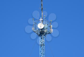 Mast tower relay Internet signals and telephone signals.