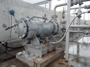 The pump for pumping of oil and  products. Oil refinery. Equipment for primary oil refining.