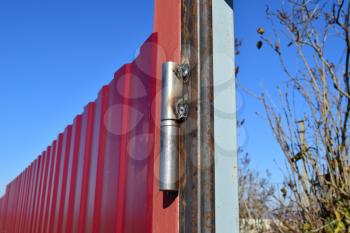 The welded canopies for gate. Installation of gate in a fence.