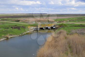 Bridges through irrigation canals. Rice field irrigation system.