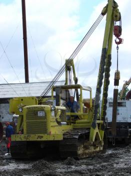 Sakhalin, Russia - 12 November 2014: Catarpillar with the crane. Equipment for construction works.       