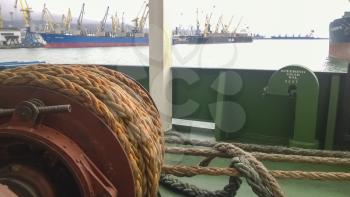 Mechanisms of tension control ropes. Winches. Equipment on the deck of a cargo ship or port.