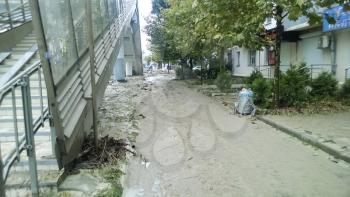 Novorossiysk, Russia - September 16, 2016: Consequences of the strongest downpour in the city of Novorossiysk. Riot of the elements. Mud deposits on the streets.