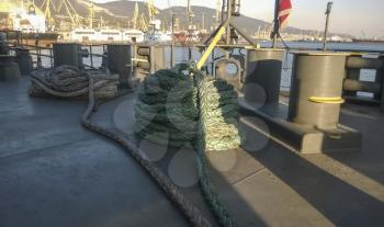 Mooring bollard on the decks of an industrial seaport