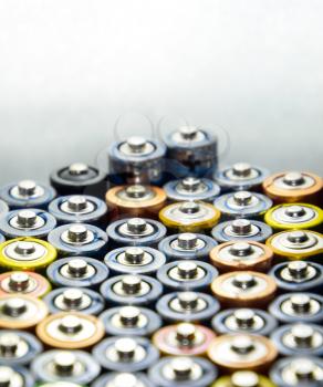 Salt and alkaline batteries, a source of energy for portable technology. AAA and AA batteries