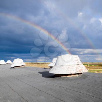 Rainbow, view from the roof of the building. Ventilation outlets on the roof of the building.
