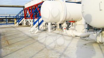 Heat exchangers in a refinery. The equipment for oil refining. Heated gasoline air cooler