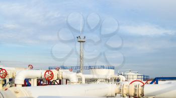 Pipes over Gasoline air coolers. Oil refinery. Equipment for primary oil refining.