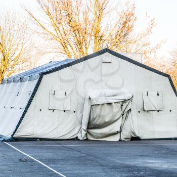 huge tent for a large group of people. Army headquarters tent. Awning canopy