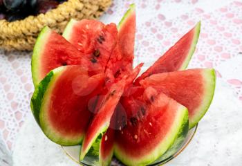 Cut watermelon on the table. Ripe watermelon