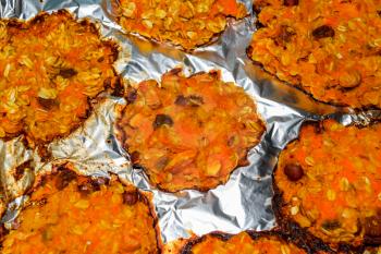Baked in foil cakes from pumpkin and oatmeal