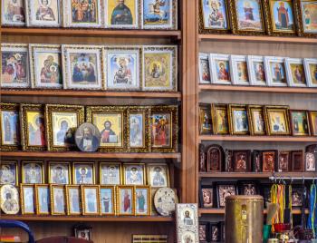 Gorny settlement, Russia - August 22, 2018: A church shop. Icons, candles and other Christian attributes are on sale.