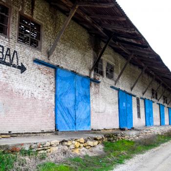 Slavyansk-on-Kuban, Russia - March 30, 2018: The old building at the railway station, inscription collapsed. Abandoned Soviet buildings.