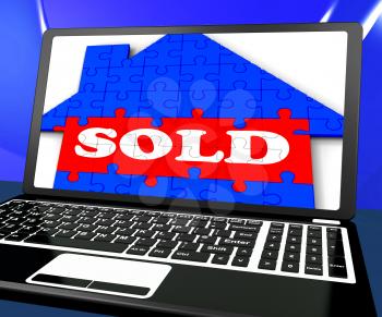 Sold On House On Laptop Shows Sold Property Or Sealed Agreement