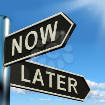 Now Or Later Signpost Shows Delay Deadlines And Urgency