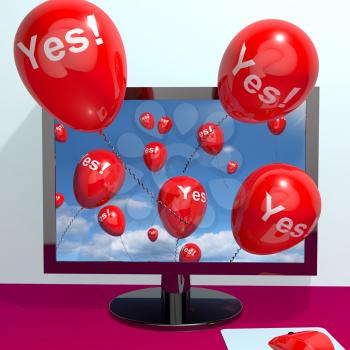 Yes Balloons From A Computer Shows Approval And Support Message Online