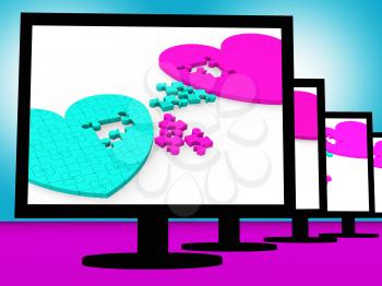 Two Hearts On Monitors Showing Celebrities' Romances Or Soap Operas