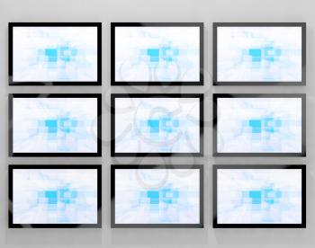 TV Monitors Wall Mounted Representing High Definition Television Or HDTVs