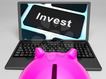 Invest Key On Laptop Showing Investment Market And Monetary Growth