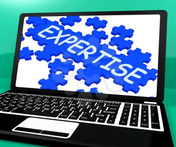 Expertise Puzzle On Notebook Showing Great Computer Skills And Abilities