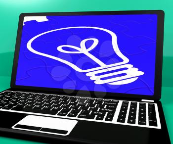 Bulb Puzzle On Notebook Showing Computer Energy And Online Creativity