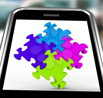 Puzzle Square On Smartphone Shows Unity And Teamwork