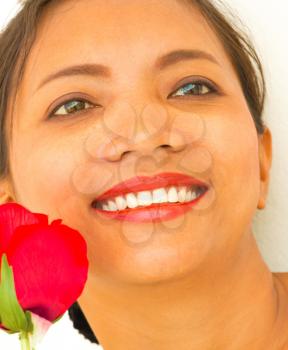 Smiling Girl With Rose Showing Joyful Happiness