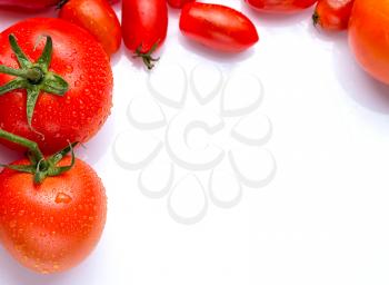 Fresh red tomatoes on white background with copy space